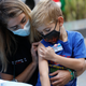 Image for article titled Parents Feel Like They're 'Screaming Into a Void,' But at Least Now Their Kids Can Get Vaccinated